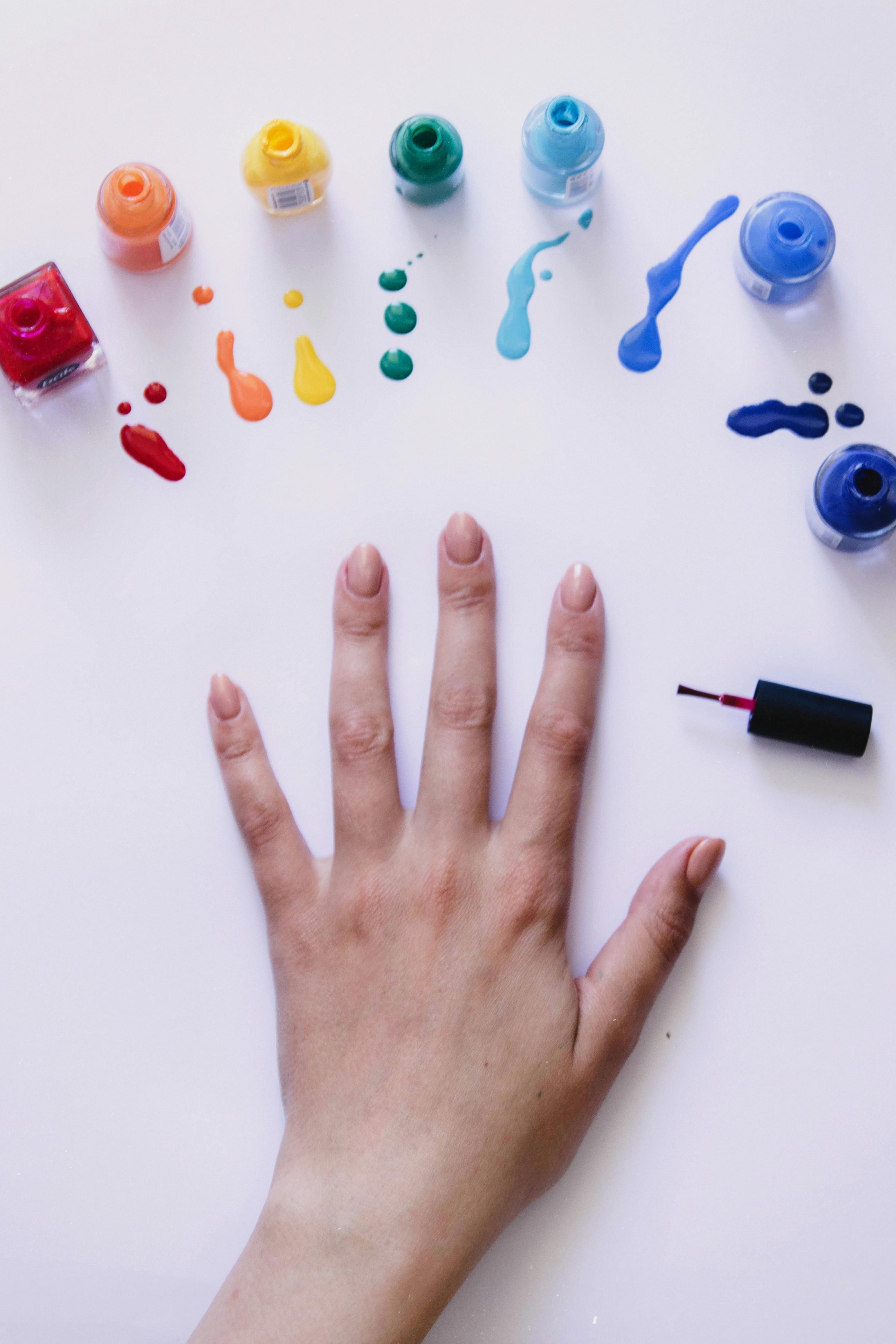Colourful nail art polishes and tools arranged beautifully